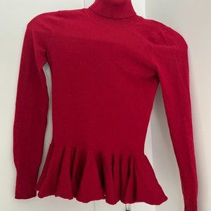 Tularosa: Peplum Turtleneck